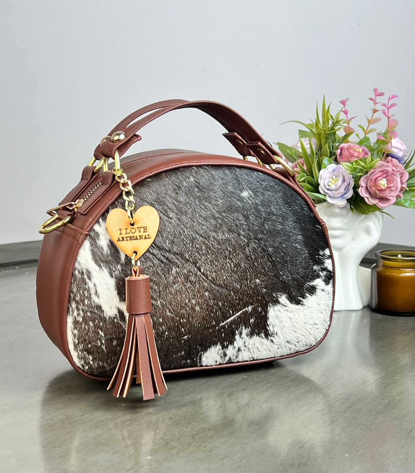 BOLSO MEDIO CIRCULO COMINO PELO VARIABLE
