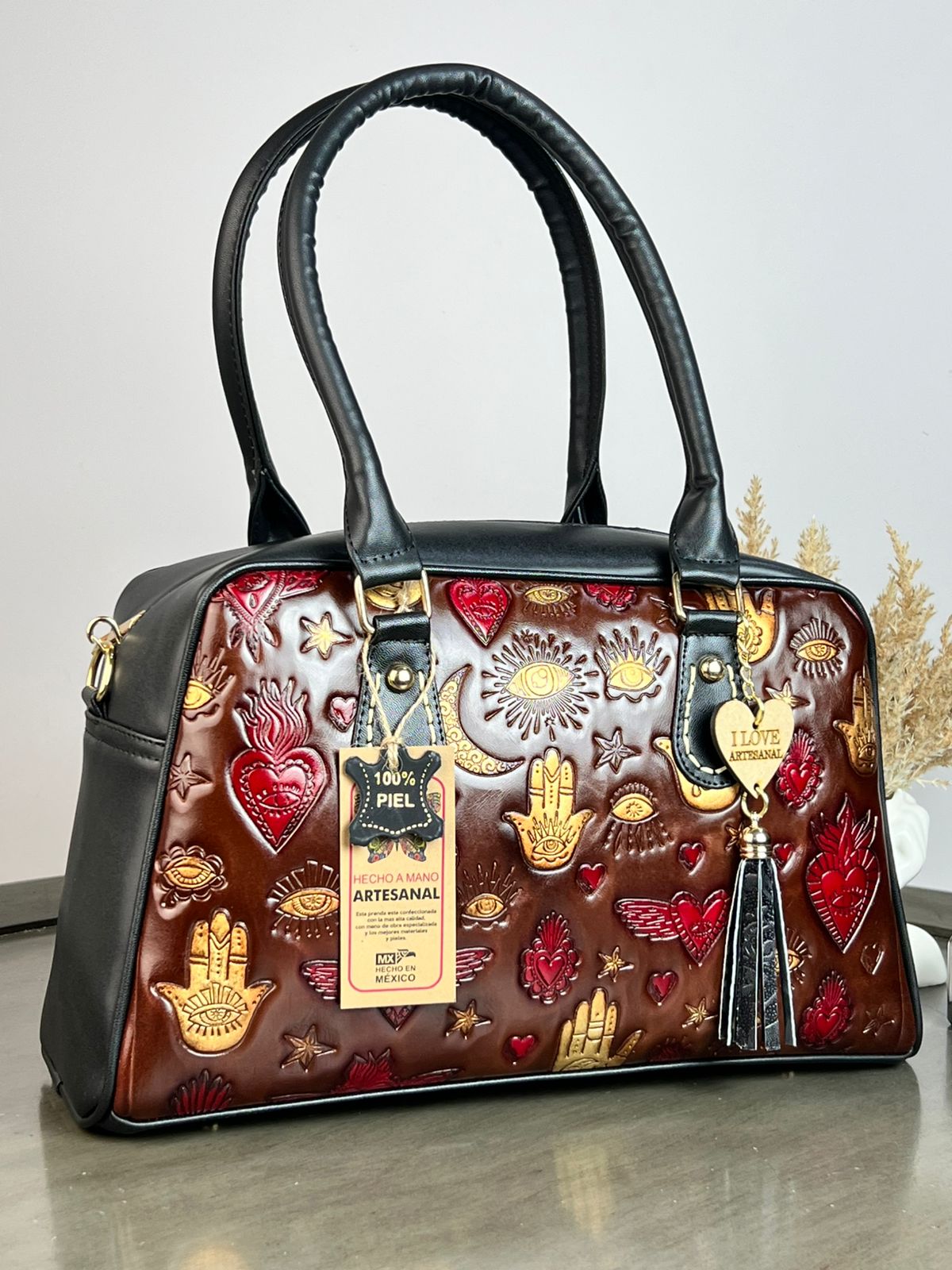 MOD ARTESANAL SOL MALETA MANOS MARRON/NEGRO