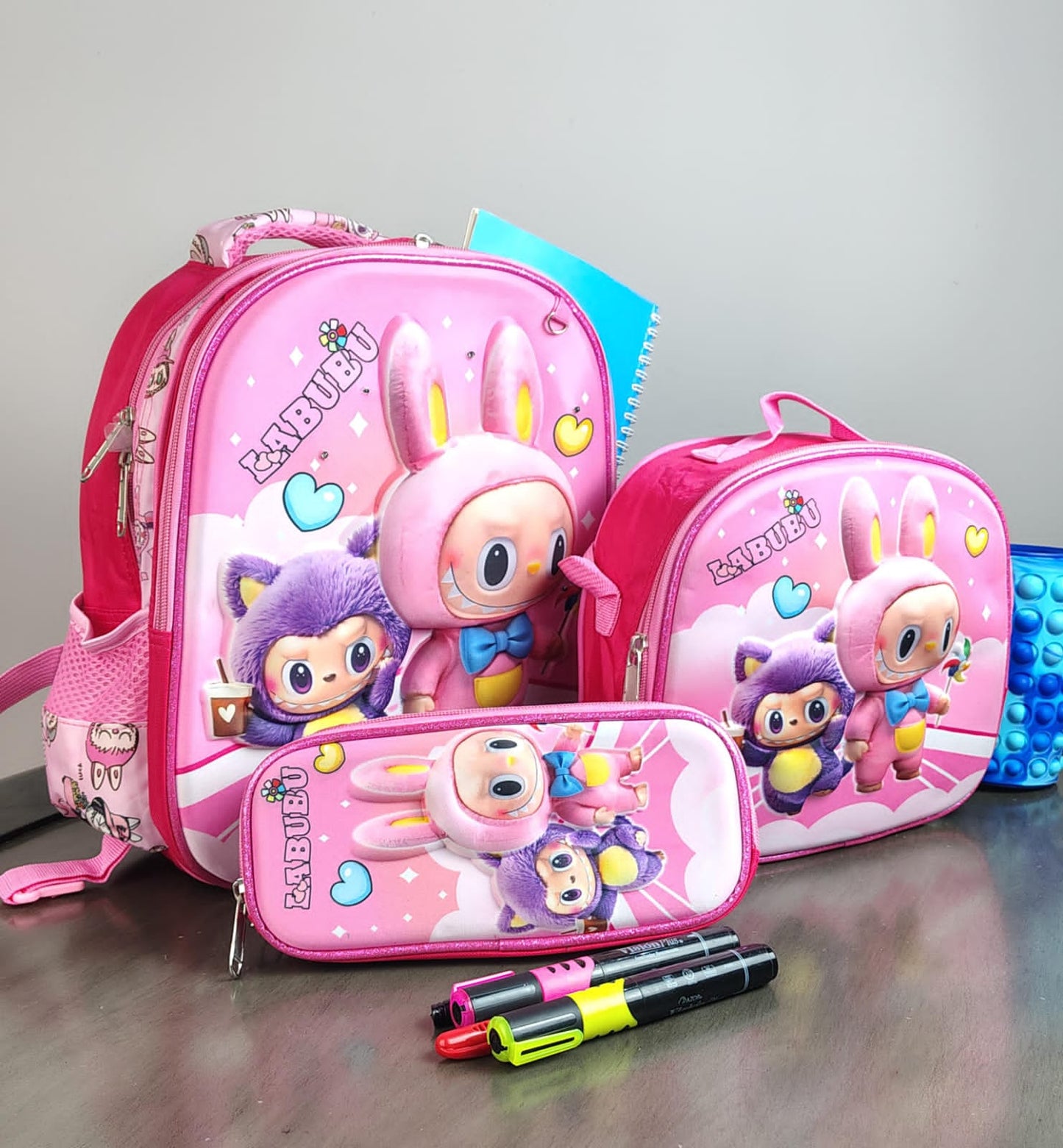 COMBO KINDER LABUBU ROSA Y MORADO