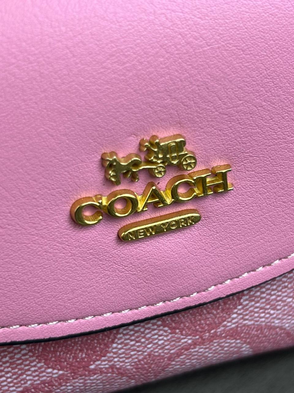 MONEDERO COACH ROSA