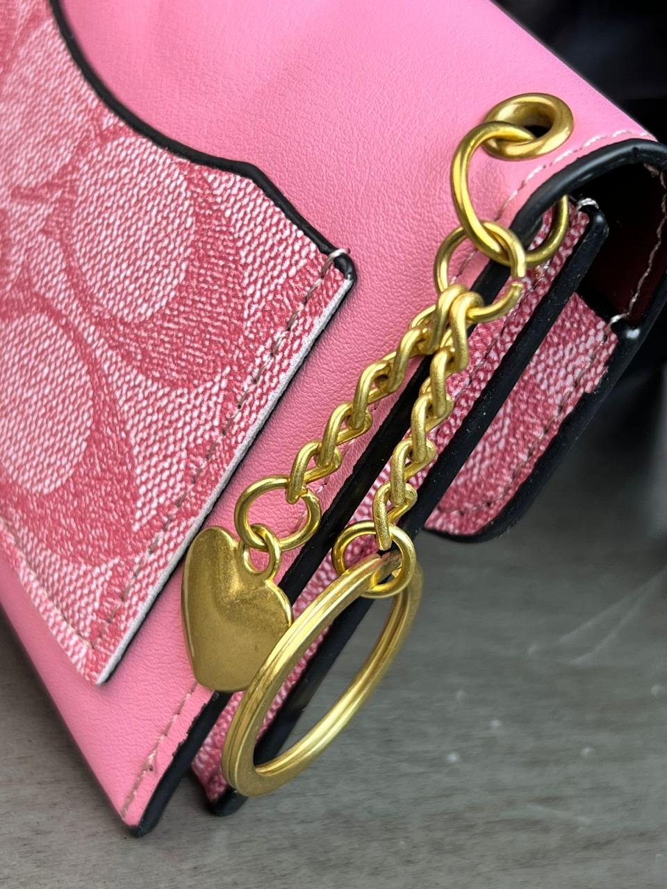 MONEDERO COACH ROSA
