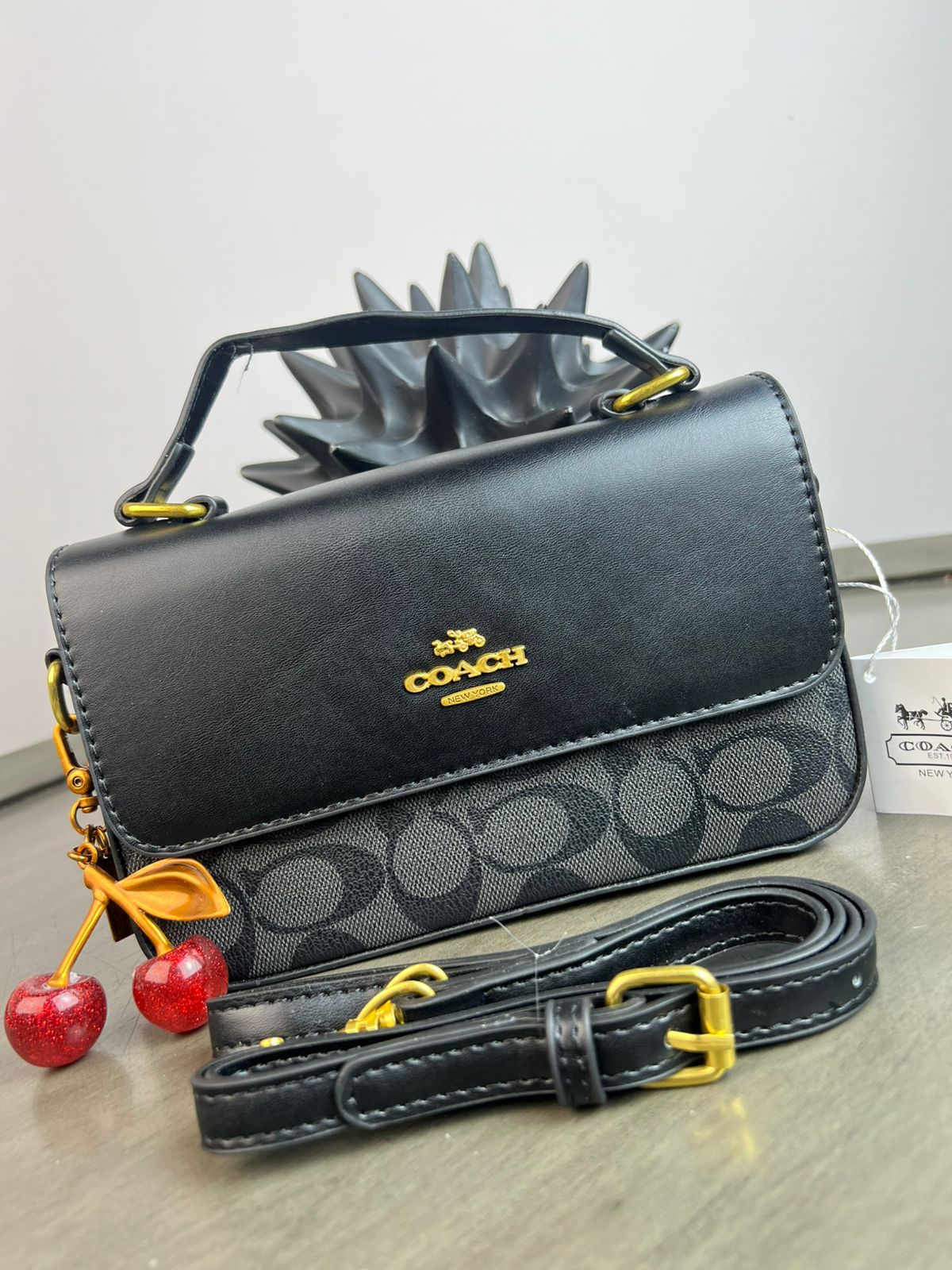 CROSSBODY COACH LLAVERO CEREZA/ CAFE OSCURO