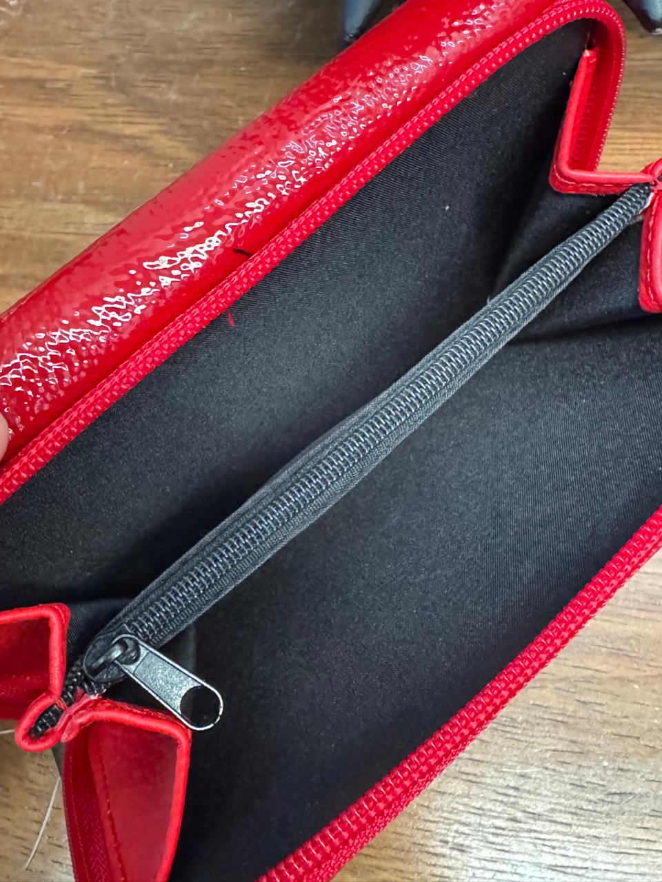 CARTERA PORTUGAL BROCHE 100% PIEL NEGRO PATA DE AVESTRUZ