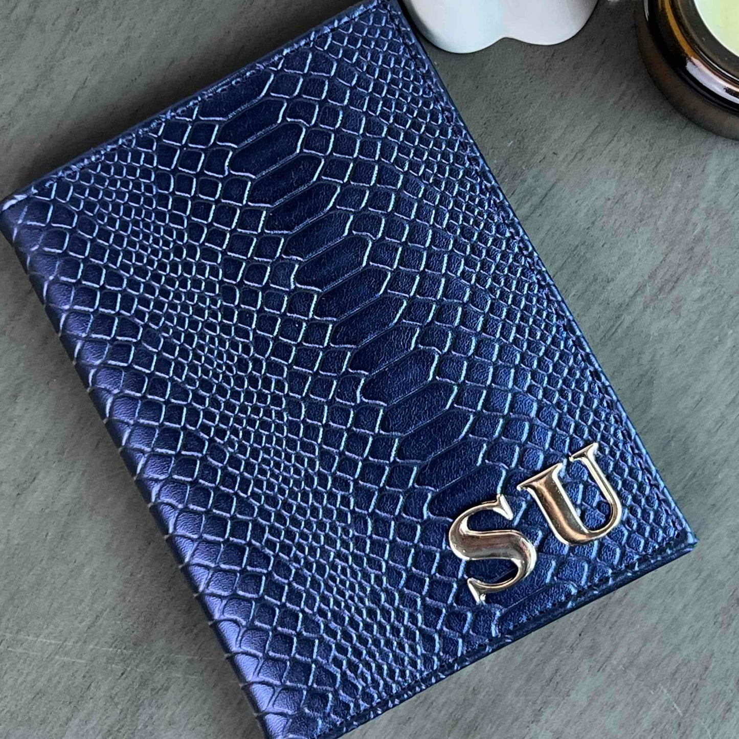 PORTAPASAPORTE IND AZUL MARINO METALICO