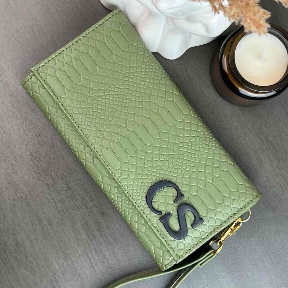 CARTERA MUÑEQUERA SELVA