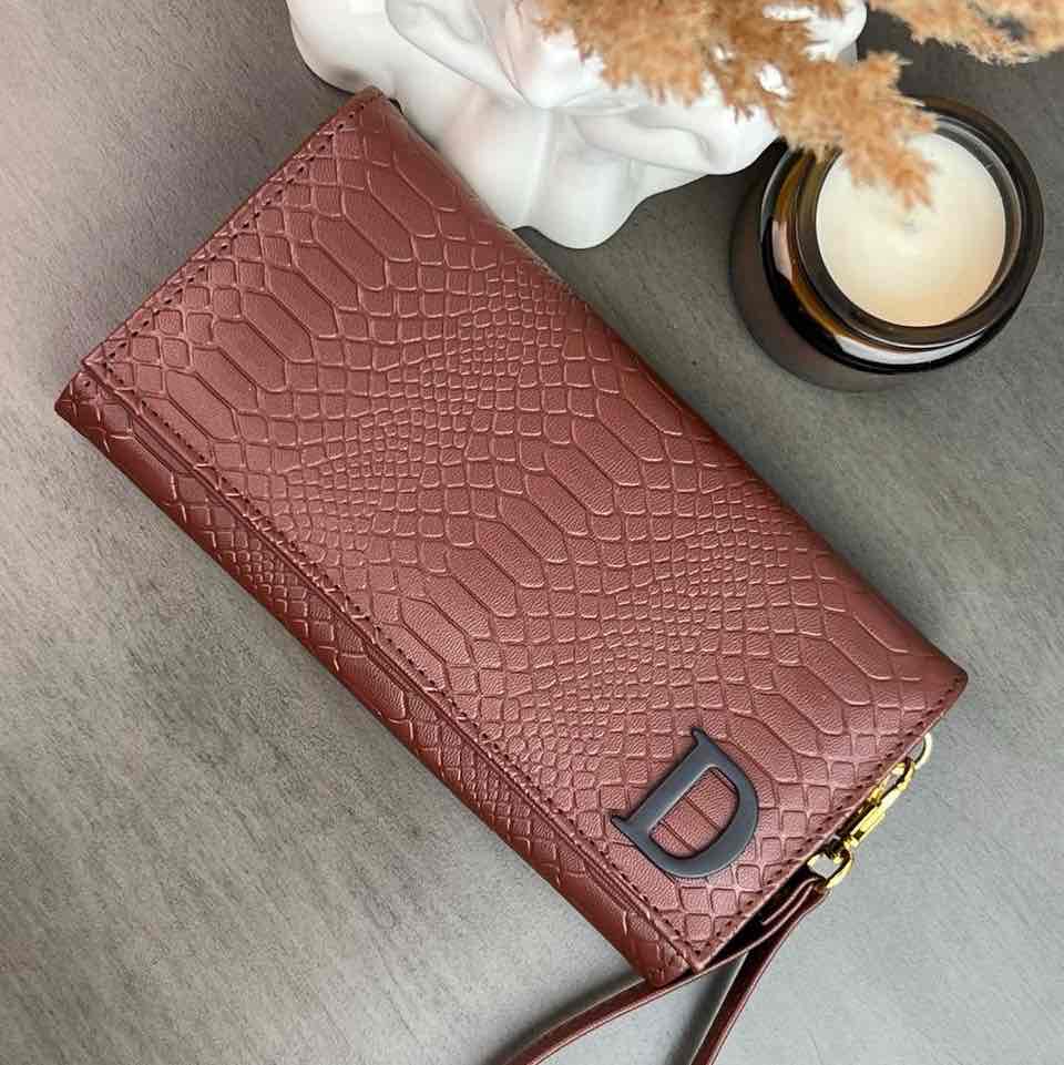CARTERA MUÑEQUERA COMINO