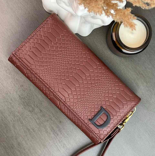 CARTERA MUÑEQUERA COMINO
