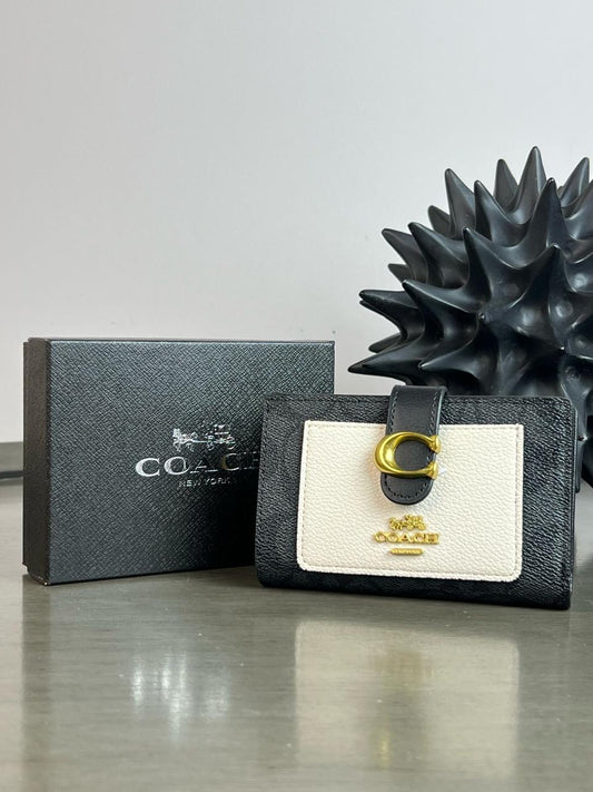 CARTERA COACH BROCHE NEGRO-HUESO