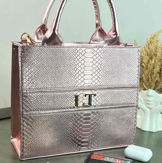 TOTE CLASICA MEDIANA ROSA CLARO METÁLICO
