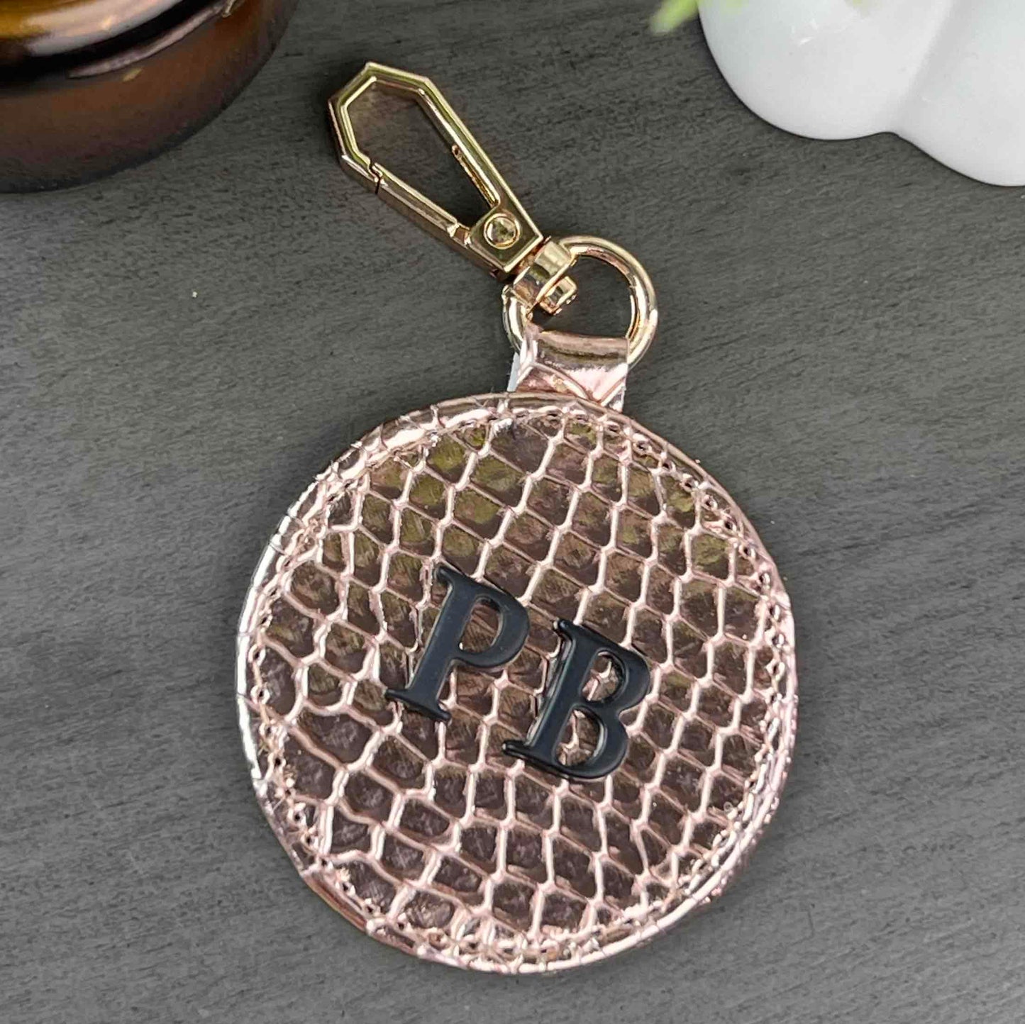 LLAVERO CIRCULAR ORO ROSADO PITON