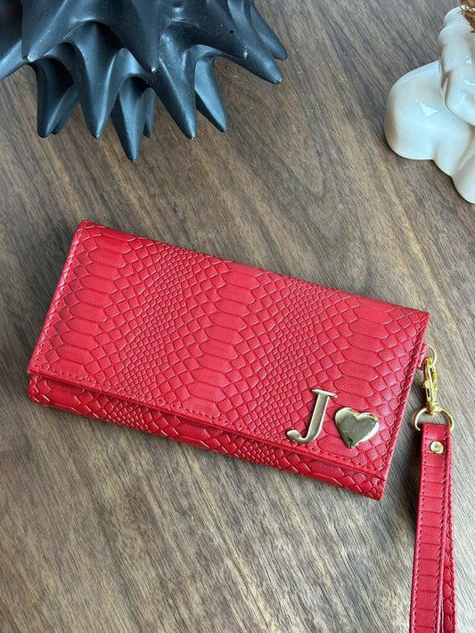 CARTERA MUÑEQUERA ROJO