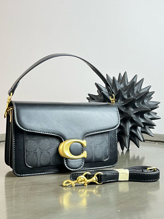 IMPORTACION CROSSBODY COACH NEGRO LISO BOLSILLO ESTAMP. NEGRO
