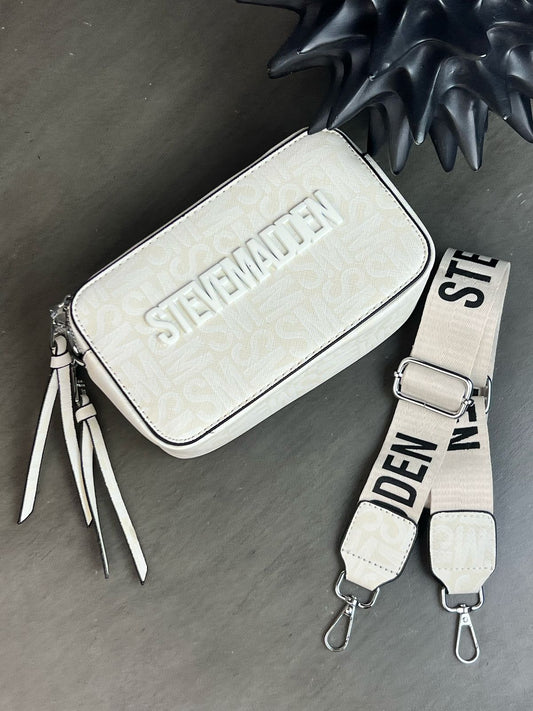IMPORTACION CROSSBODY CIERRE STEVEN MADDEN HUESO