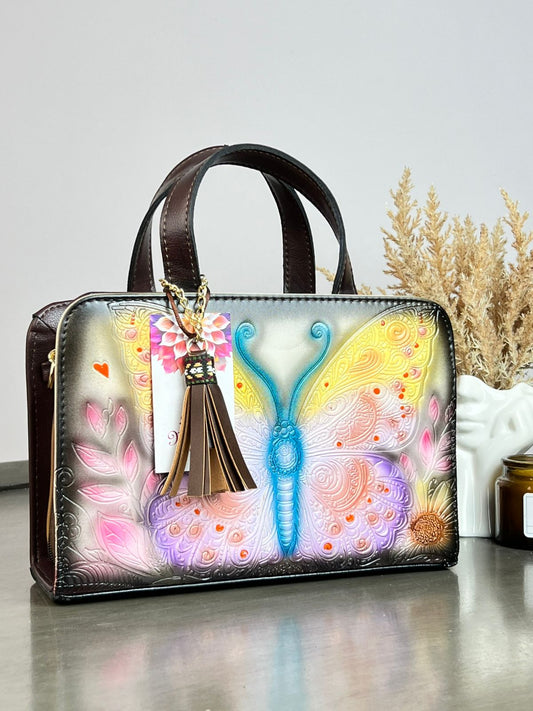 MAOMA CROSSBODY MARIPOSA HUESO/TONOS LILA Y AMARILLO