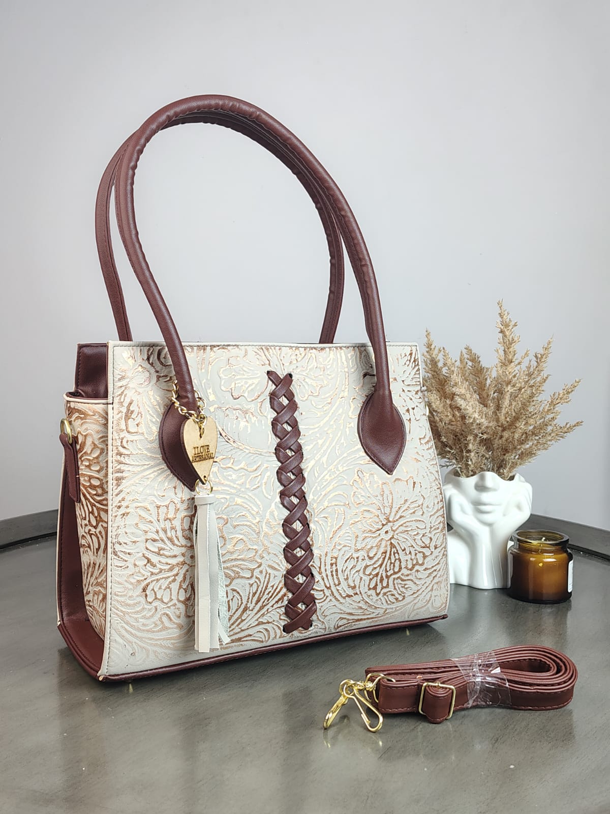 BOLSA NICOLE PIEL DE FLORES VAINILLA COBRE/COMINO