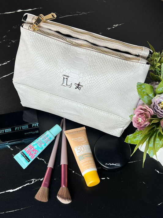 COSMETIQUERA DE VIAJE HUESO PITÓN