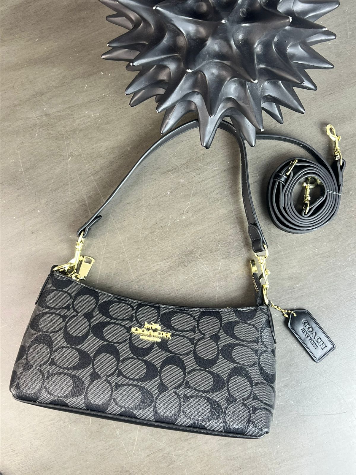 IMPORTACION BAGUETTE COACH NEGRO