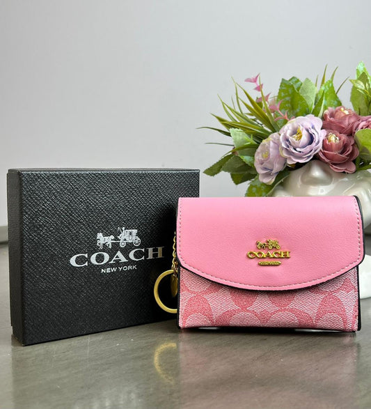 MONEDERO COACH ROSA