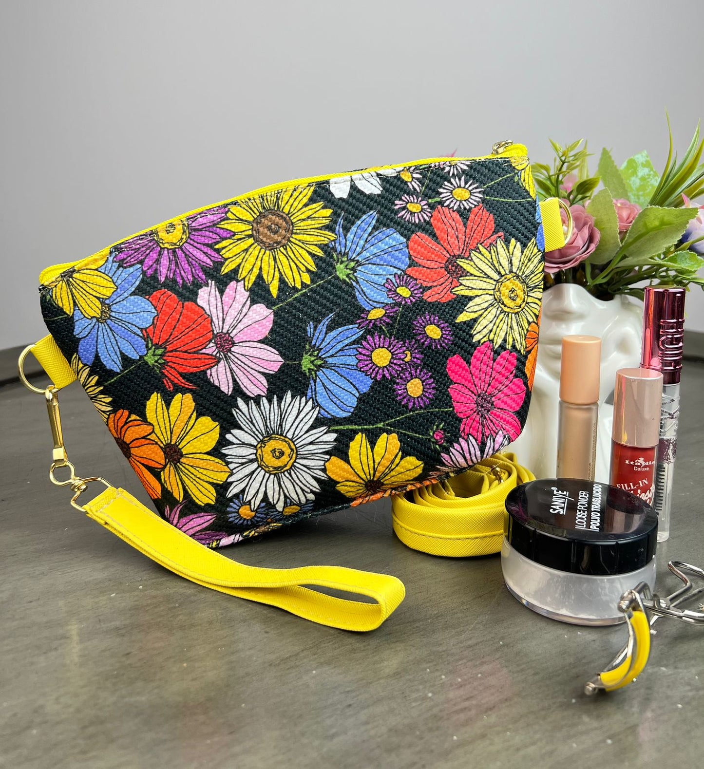 COSMETIQUERA YUTE MARGARITAS COLORES F NEGRO