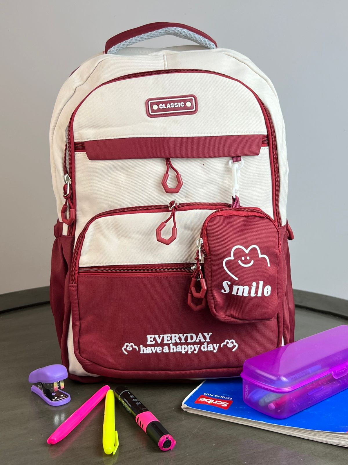 MOCHILA CON MONEDERO SMILE VINO/HUESO