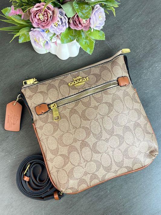 BANDOLERA COACH /CAFE ESTAMPADO