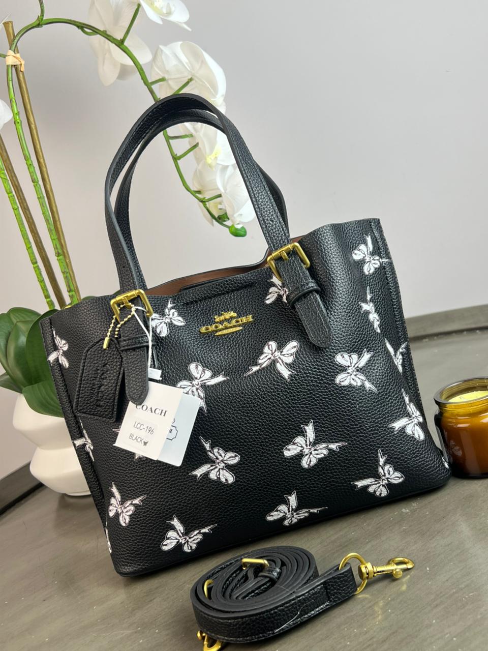 ESTILO AL CORTE COACH /NEGRA MARIPOSAS