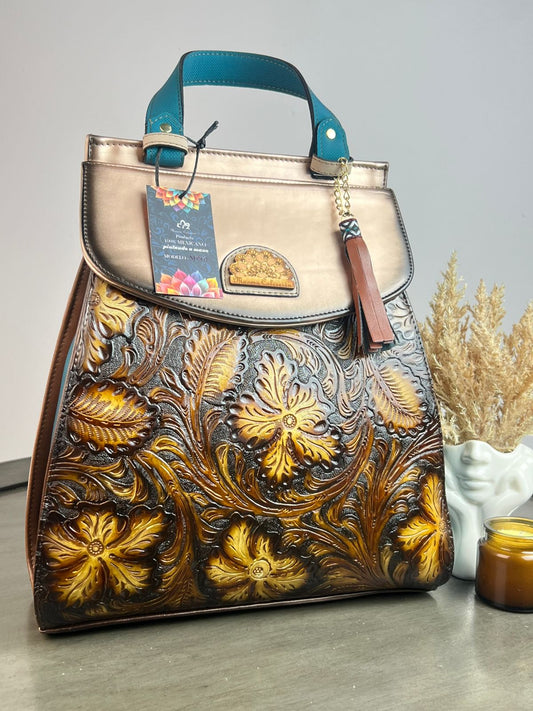 MAOMA GDE MOCHILA VERO FLORES Y HOJAS CAMEL TAPA BRONCE