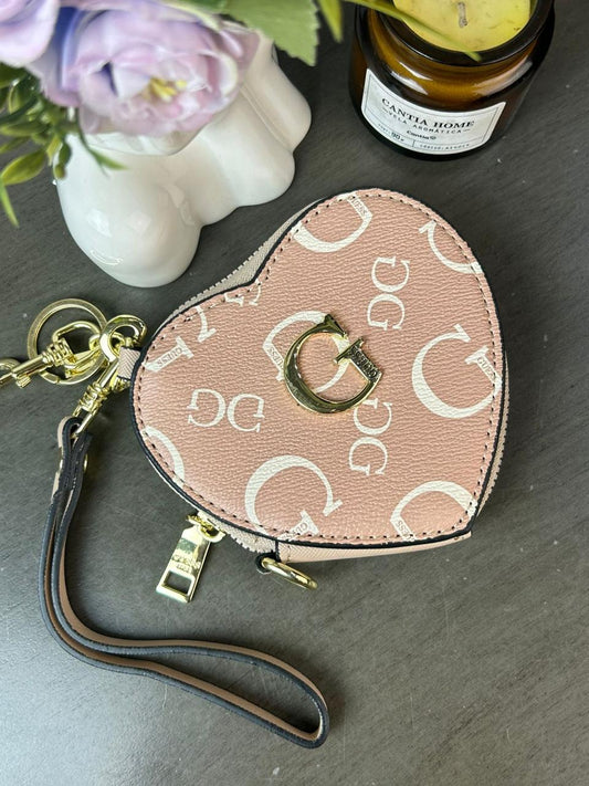 MONEDERO CORAZON GUESS MAQUILLAJE ESTAMPADO