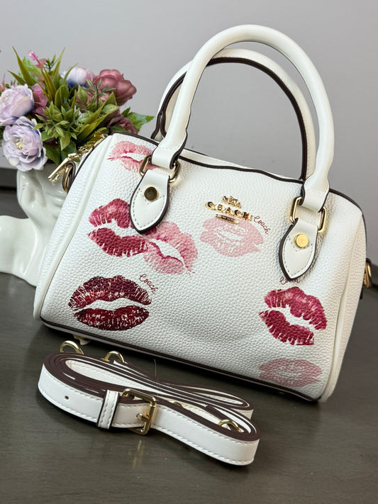 BOLSO COACH MALETITA BLANCO BESOS ESTAMPADO