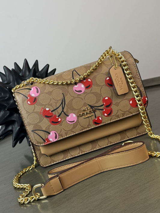 CROSSBODY COACH CADENA KHAKI CEREZAS BESOS ESTAMPADO