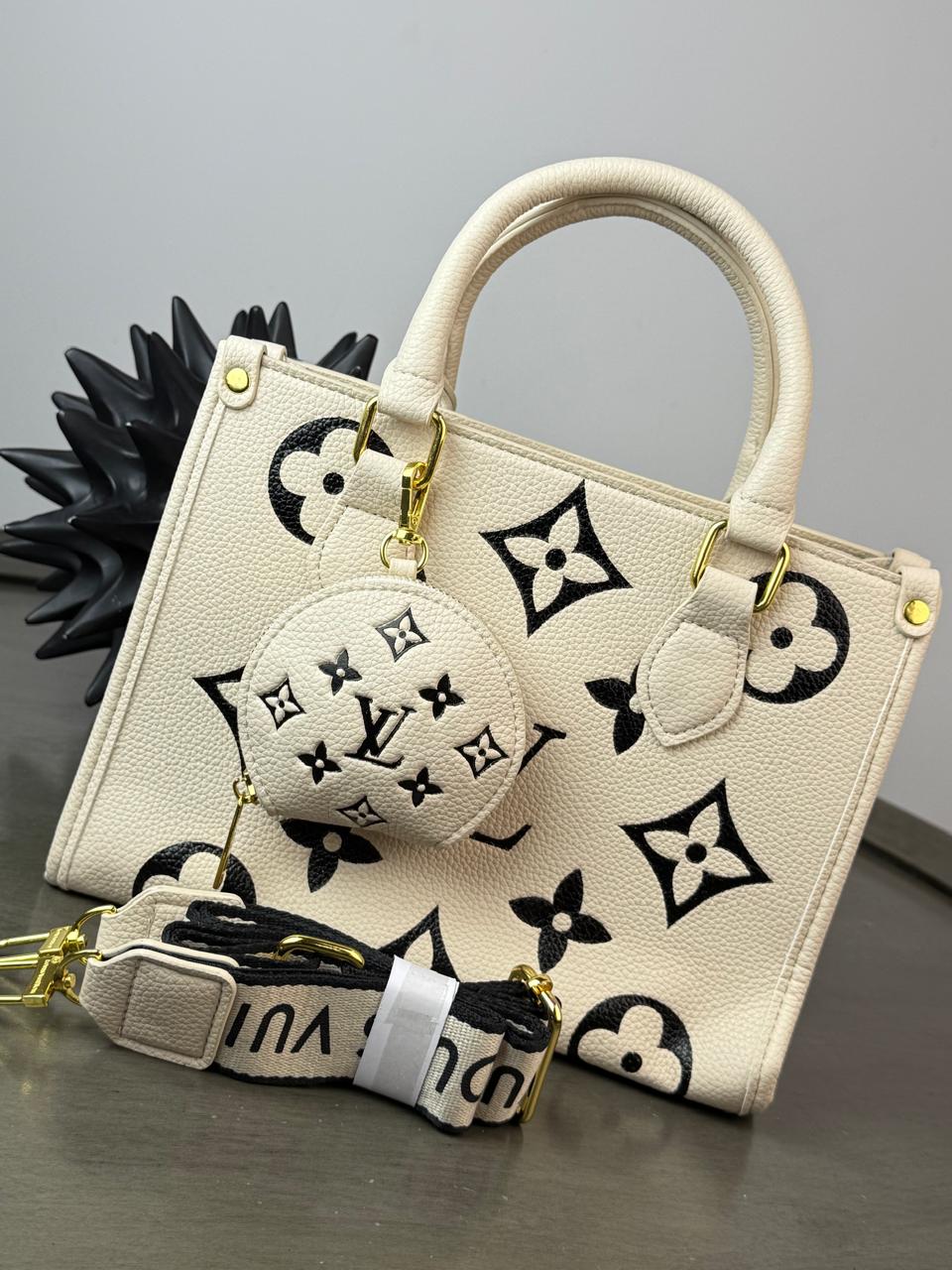 CROSSBODY CON MONEDERO LOUIS VUITTON HUESO