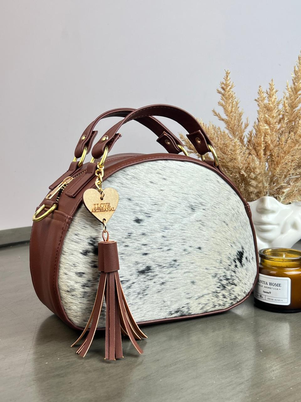 BOLSO MEDIO CIRCULO COMINO PELO VARIABLE