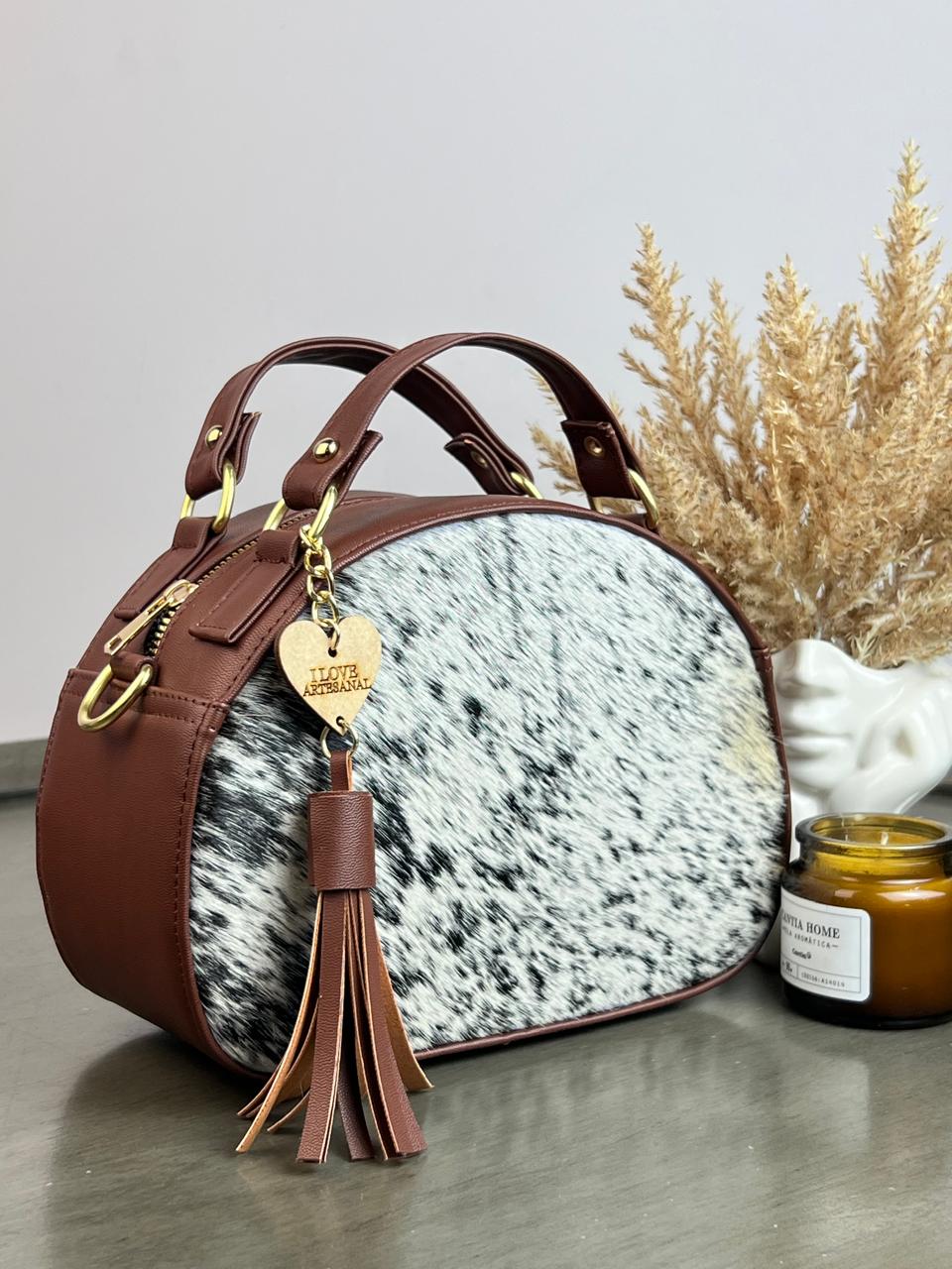 BOLSO MEDIO CIRCULO COMINO PELO VARIABLE