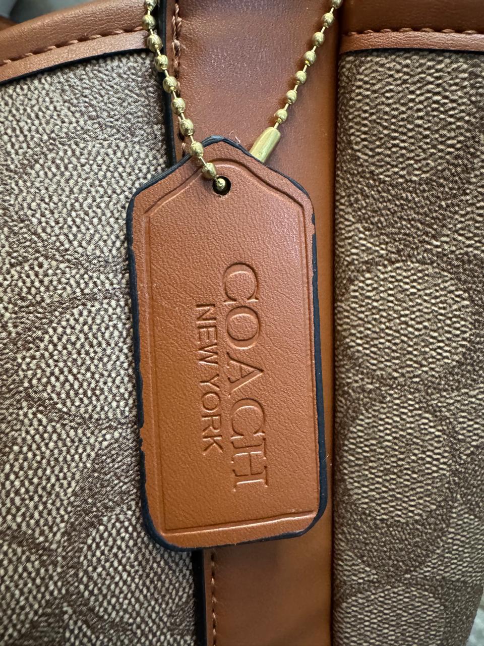 IMPORTACION COACH MARIPOSA BEIGE ESTAMPADO