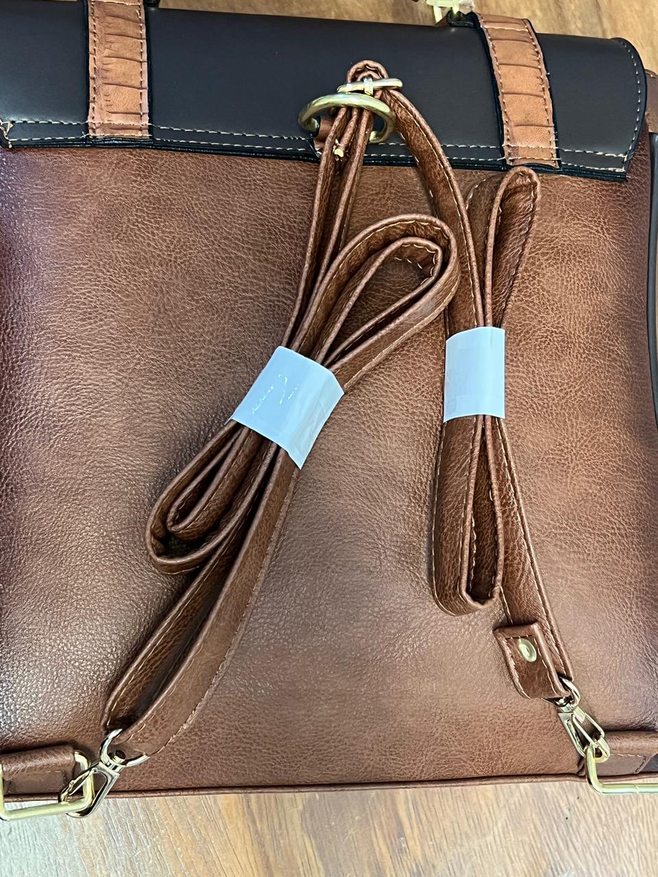 DB MOCHILA HEBILLAS ATRAPASUEÑOS HUESO TAPA CHOCOLATE