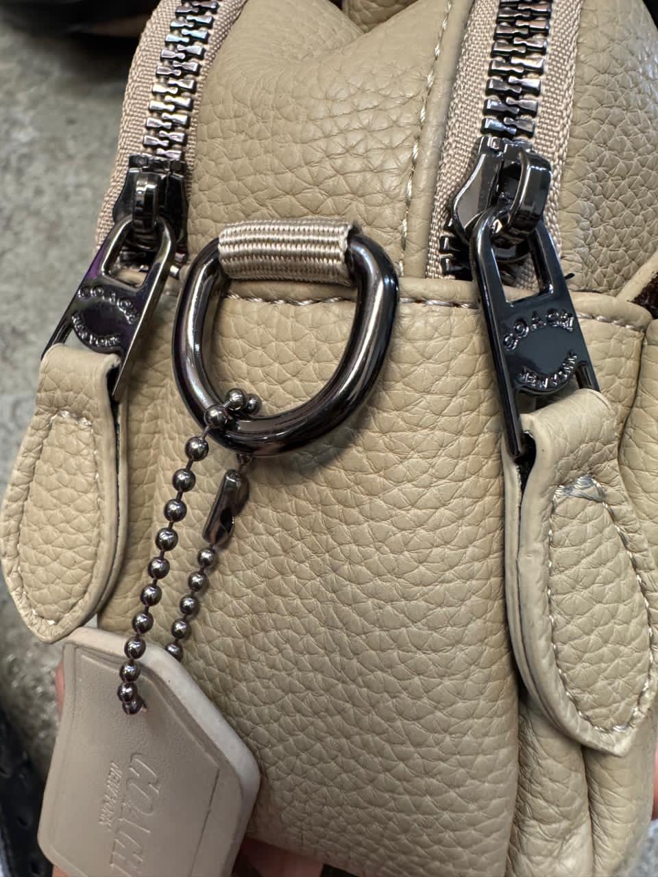 COACH SOBAQUERA KHAKI CON ESTAMPADO