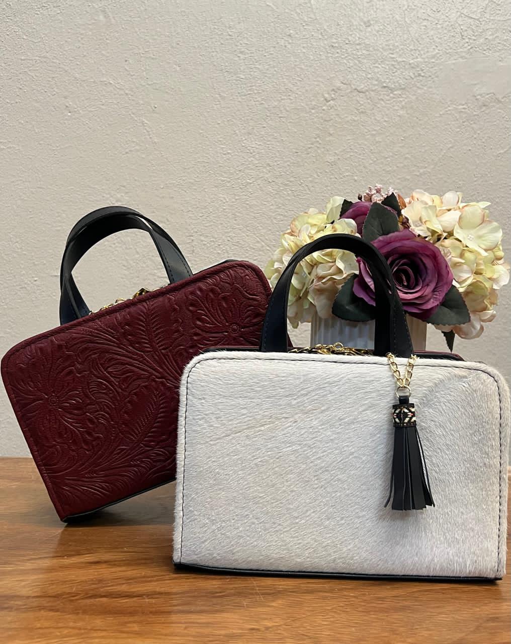 CROSSBODY DOBLE CARA PELO VARIABLE-PIEL MERLOT