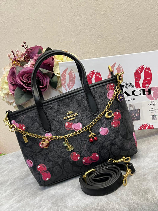 BOLSO COACH DIJES NEGRO CEREZAS