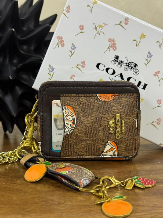 KIT MONEDERO COACH NARANJAS CAFE