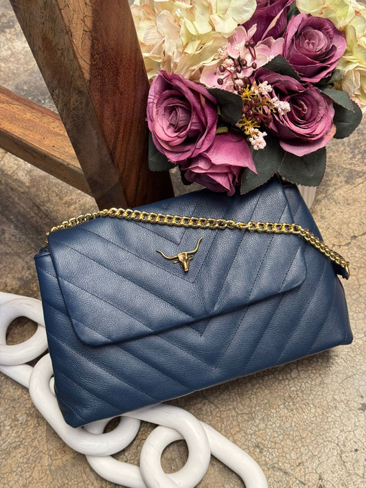 SHURY DE PIEL CAPITONADO CHEVRON COLOR AZUL MARINO