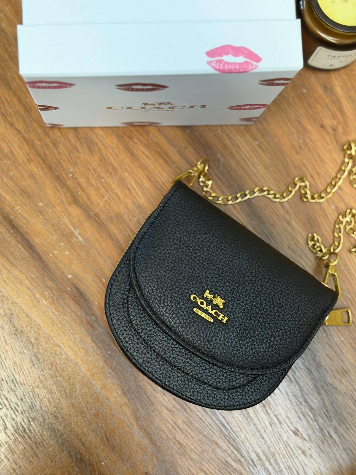 MINI FLAP COACH NEGRO LISO