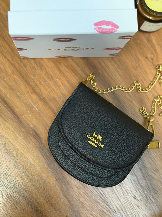 MINI FLAP COACH NEGRO LISO