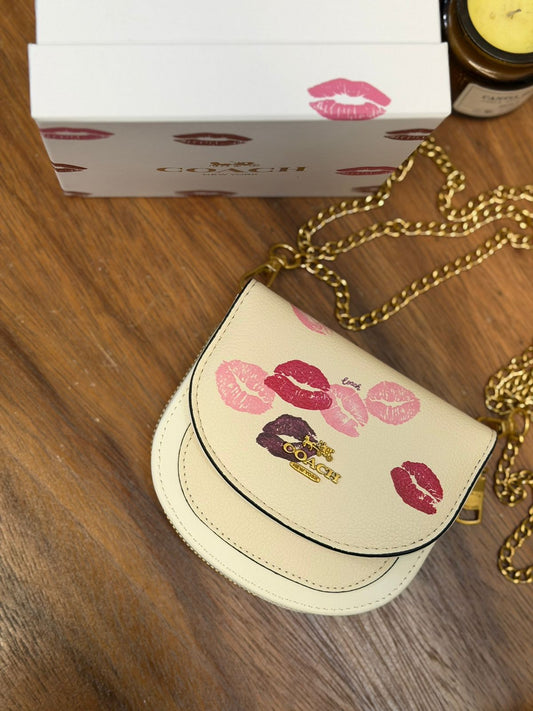 MINI FLAP COACH HUESO BESOS