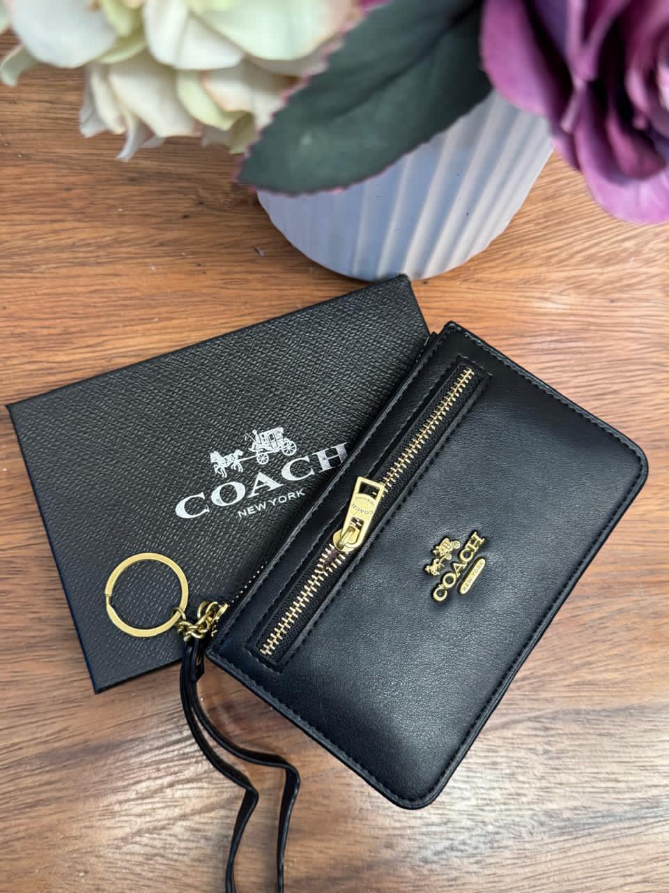 MONEDERO ZIP COACH NEGRO LISO
