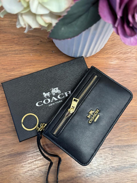 MONEDERO ZIP COACH NEGRO LISO