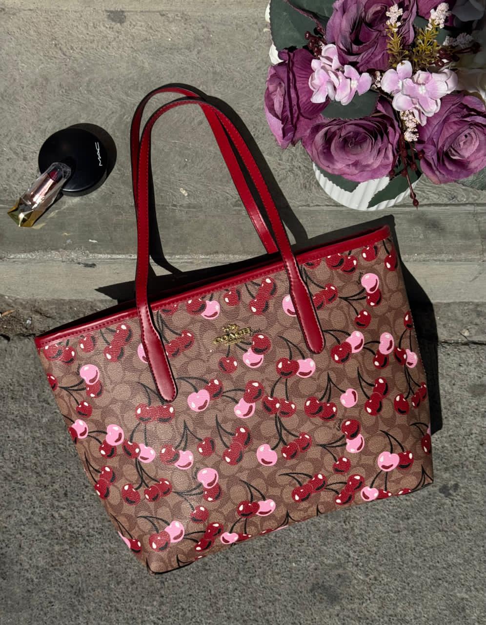 BOLSA COACH GRANDE KHAKI CEREZAS