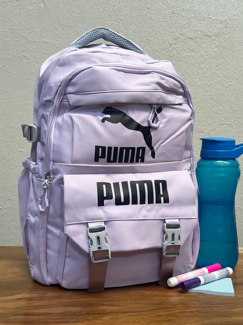 MOCHILA BROCHES PUMA LILA