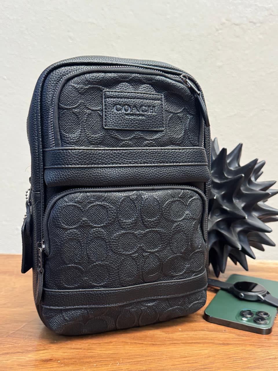 PECHERA DE IMPORTACION COACH NEGRO RELIEVE