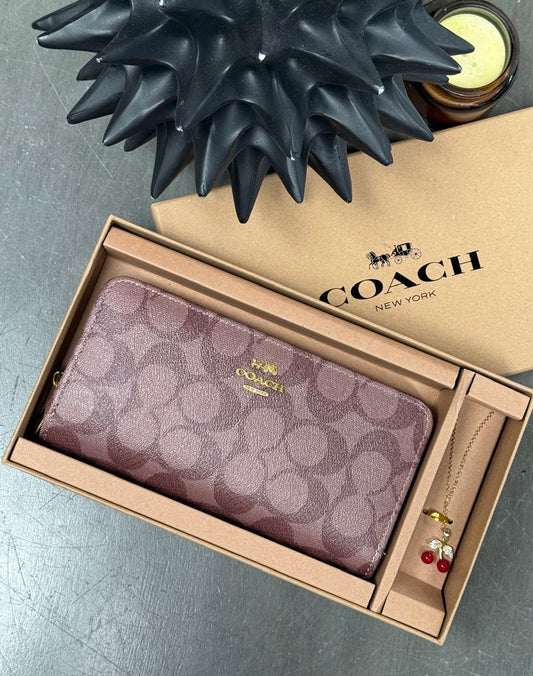 CARTERA COACH DIJE KHAKI ESTAMPADO