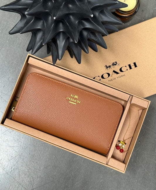 CARTERA COACH DIJE SHEDRON LISO